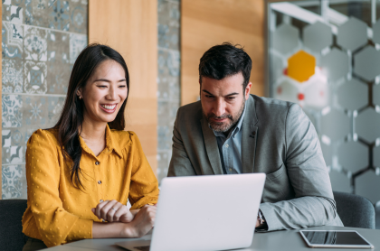 Couple working on laptop
